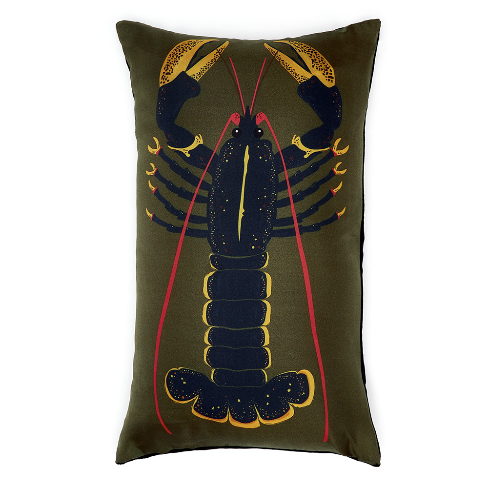Blue lobster on green cushion