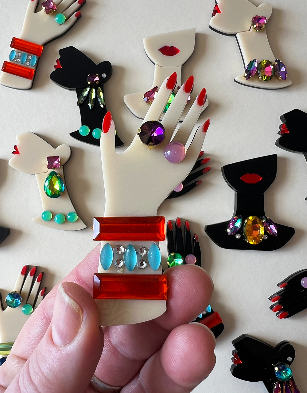 Hand Three - orange/turquoise (pink ring)