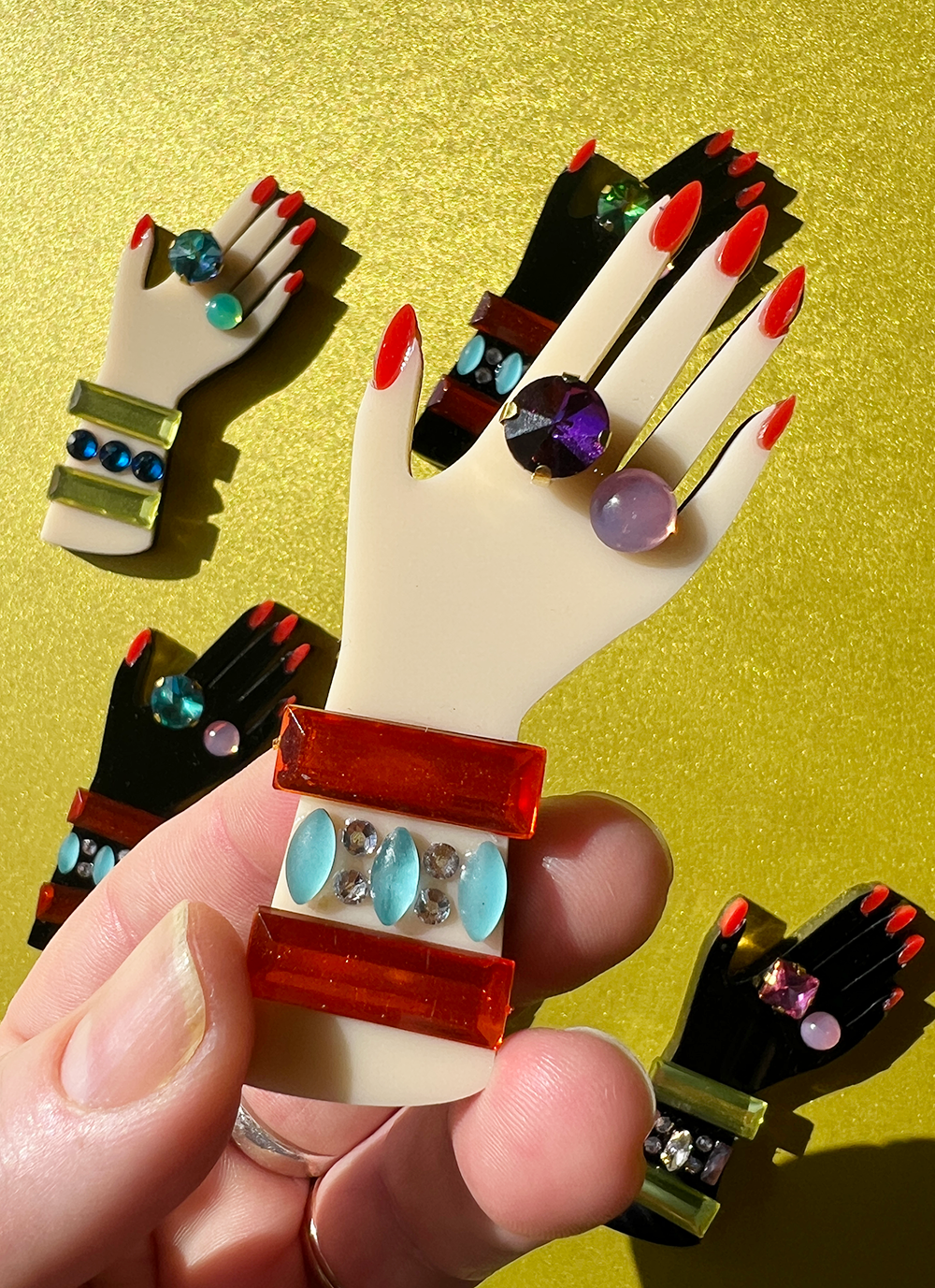 Hand Three - orange/turquoise (pink ring)